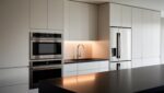 Contemporary Matte-Finish Island Kitchen with Soft Ambient Lighting